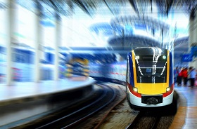 a train pulls into a station platform