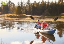 PEO_Pensioners_couple in a canoe_trees in background 2